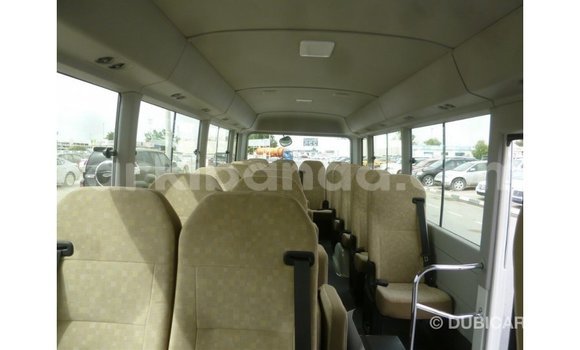Gura Imported Toyota Coaster White Imodoka i Import - Dubai mu Uganda Gura Imported Toyota Coaster White Imodoka i Import - Dubai mu Uganda