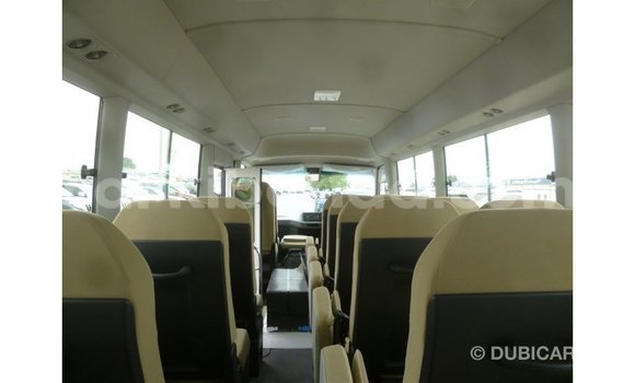 Gura Imported Toyota Coaster White Imodoka i Import - Dubai mu Uganda Gura Imported Toyota Coaster White Imodoka i Import - Dubai mu Uganda
