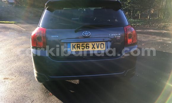 Gura Yakoze Toyota Corolla Beige Imodoka i Kampala mu Uganda Gura Yakoze Toyota Corolla Beige Imodoka i Kampala mu Uganda