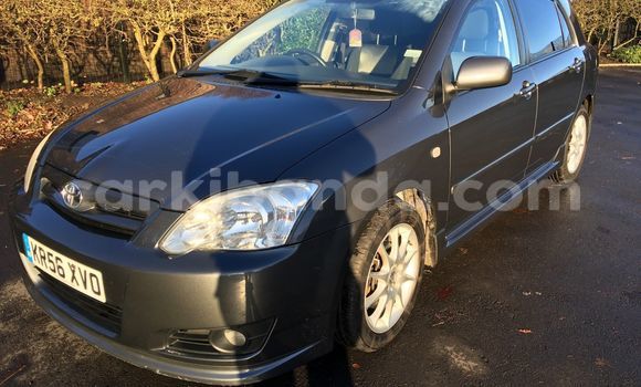 Gura Yakoze Toyota Corolla Beige Imodoka i Kampala mu Uganda Gura Yakoze Toyota Corolla Beige Imodoka i Kampala mu Uganda