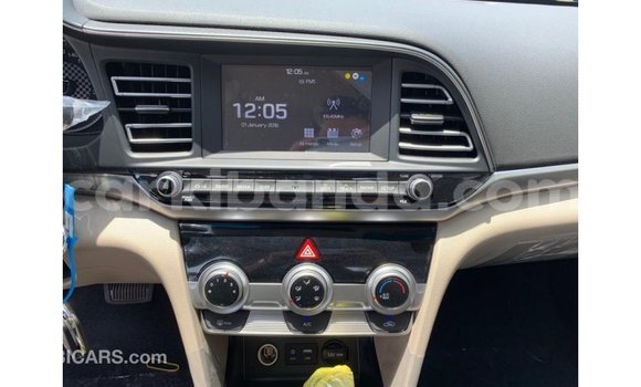 Gura Imported Hyundai Elantra White Imodoka i Import - Dubai mu Uganda Gura Imported Hyundai Elantra White Imodoka i Import - Dubai mu Uganda