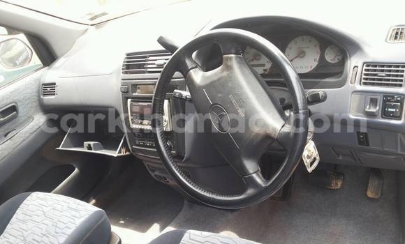 Gura Yakoze Toyota IST Black Imodoka i Kampala mu Uganda Gura Yakoze Toyota IST Black Imodoka i Kampala mu Uganda