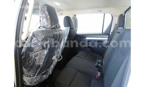 Gura Imported Toyota Hilux White Imodoka i Import - Dubai mu Uganda Gura Imported Toyota Hilux White Imodoka i Import - Dubai mu Uganda