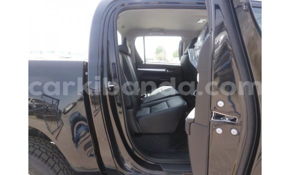 Gura Imported Toyota Hilux Black Imodoka i Import - Dubai mu Uganda Gura Imported Toyota Hilux Black Imodoka i Import - Dubai mu Uganda