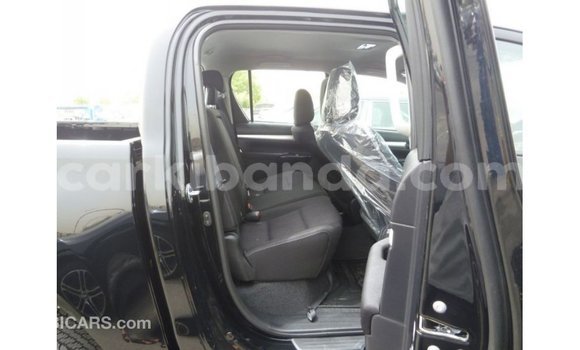 Gura Imported Toyota Hilux Black Imodoka i Import - Dubai mu Uganda Gura Imported Toyota Hilux Black Imodoka i Import - Dubai mu Uganda
