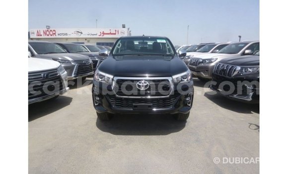 Nunua Imported Toyota Hilux Nyeusi Gari ndani ya Import - Dubai nchini Uganda Nunua Imported Toyota Hilux Nyeusi Gari ndani ya Import - Dubai nchini Uganda