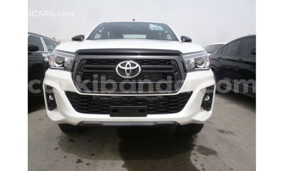Gura Imported Toyota Hilux White Imodoka i Import - Dubai mu Uganda Gura Imported Toyota Hilux White Imodoka i Import - Dubai mu Uganda