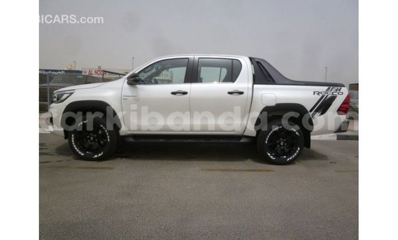 Gura Imported Toyota Hilux White Imodoka i Import - Dubai mu Uganda Gura Imported Toyota Hilux White Imodoka i Import - Dubai mu Uganda