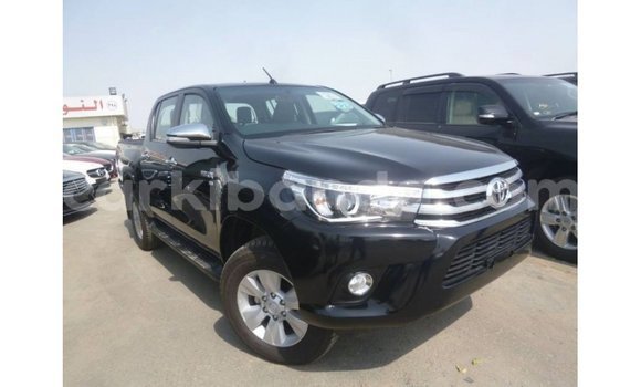 Nunua Imported Toyota Hilux Nyeusi Gari ndani ya Import - Dubai nchini Uganda Nunua Imported Toyota Hilux Nyeusi Gari ndani ya Import - Dubai nchini Uganda