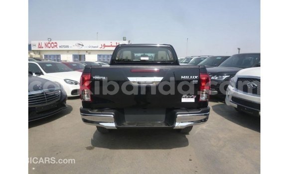 Gura Imported Toyota Hilux Black Imodoka i Import - Dubai mu Uganda Gura Imported Toyota Hilux Black Imodoka i Import - Dubai mu Uganda