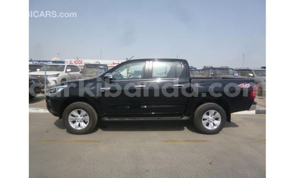 Gura Imported Toyota Hilux Black Imodoka i Import - Dubai mu Uganda Gura Imported Toyota Hilux Black Imodoka i Import - Dubai mu Uganda