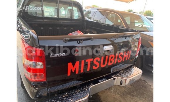 Gura Imported Mitsubishi L200 Black Imodoka i Import - Dubai mu Uganda Gura Imported Mitsubishi L200 Black Imodoka i Import - Dubai mu Uganda