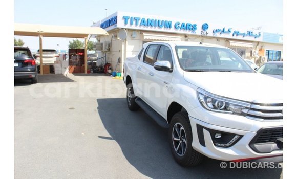 Gura Imported Toyota Hilux White Imodoka i Import - Dubai mu Uganda Gura Imported Toyota Hilux White Imodoka i Import - Dubai mu Uganda