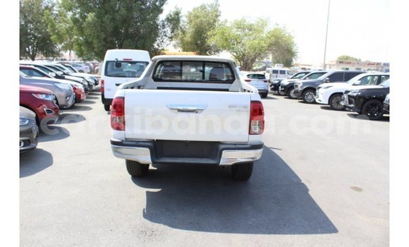 Gura Imported Toyota Hilux White Imodoka i Import - Dubai mu Uganda Gura Imported Toyota Hilux White Imodoka i Import - Dubai mu Uganda