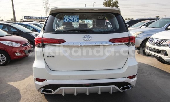 Gura Imported Toyota Fortuner White Imodoka i Import - Dubai mu Uganda Gura Imported Toyota Fortuner White Imodoka i Import - Dubai mu Uganda