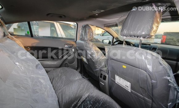 Acheter Import Voiture Kia Cerato Blanc à Import - Dubai, Ouganda Acheter Import Voiture Kia Cerato Blanc à Import - Dubai, Ouganda