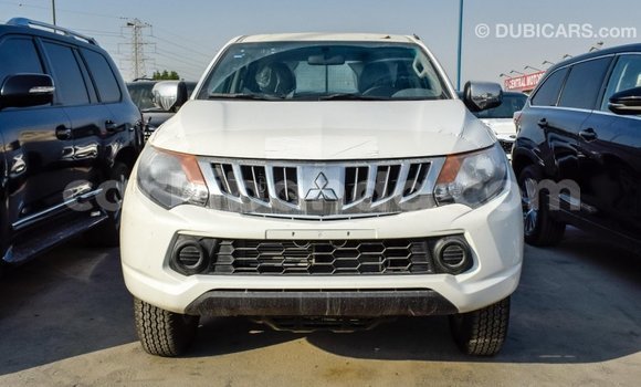 Buy Import Mitsubishi L200 White Car in Import - Dubai in Uganda Buy Import Mitsubishi L200 White Car in Import - Dubai in Uganda