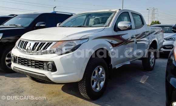 Buy Import Mitsubishi L200 White Car in Import - Dubai in Uganda Buy Import Mitsubishi L200 White Car in Import - Dubai in Uganda