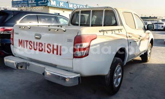 Buy Import Mitsubishi L200 White Car in Import - Dubai in Uganda Buy Import Mitsubishi L200 White Car in Import - Dubai in Uganda