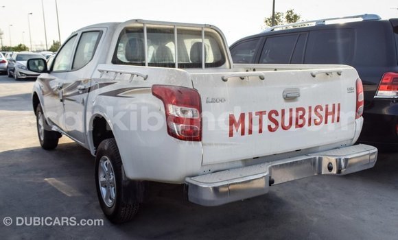 Buy Import Mitsubishi L200 White Car in Import - Dubai in Uganda Buy Import Mitsubishi L200 White Car in Import - Dubai in Uganda