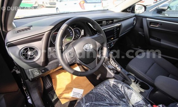 Nunua Imported Toyota Corolla Nyeusi Gari ndani ya Import - Dubai nchini Uganda Nunua Imported Toyota Corolla Nyeusi Gari ndani ya Import - Dubai nchini Uganda
