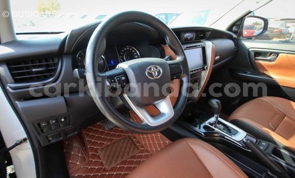 Buy Import Toyota Fortuner White Car in Import - Dubai in Uganda Buy Import Toyota Fortuner White Car in Import - Dubai in Uganda