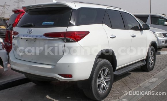 Gura Imported Toyota Fortuner White Imodoka i Import - Dubai mu Uganda Gura Imported Toyota Fortuner White Imodoka i Import - Dubai mu Uganda