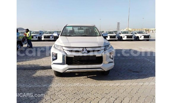 Buy Import Mitsubishi L200 White Car in Import - Dubai in Uganda Buy Import Mitsubishi L200 White Car in Import - Dubai in Uganda