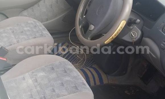 Buy Used Toyota Raum White Car in Kampala in Uganda Buy Used Toyota Raum White Car in Kampala in Uganda