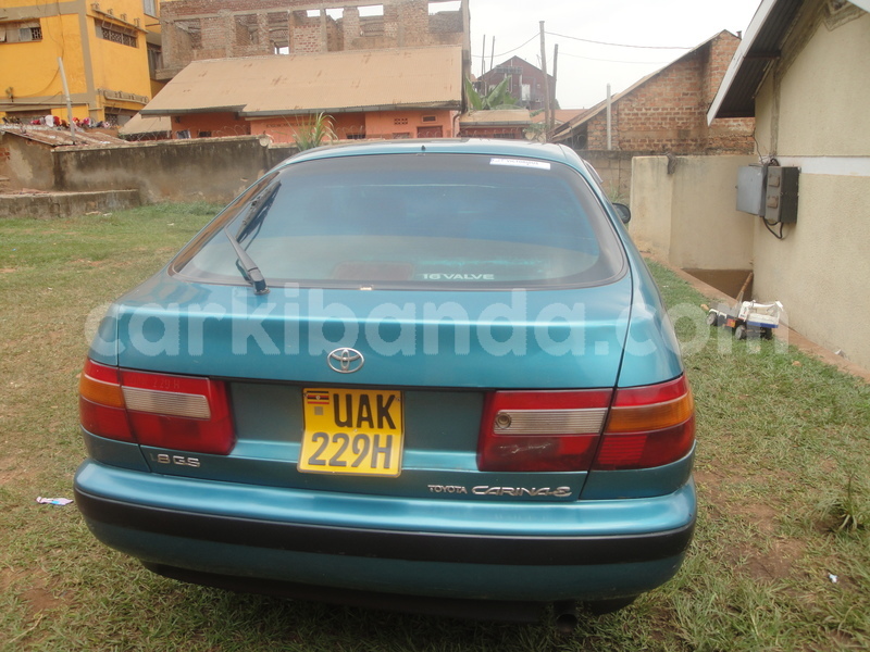 Big with watermark toyota carina e uganda kampala 8129