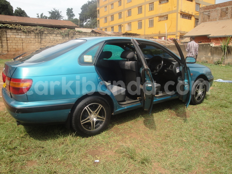 Big with watermark toyota carina e uganda kampala 8129