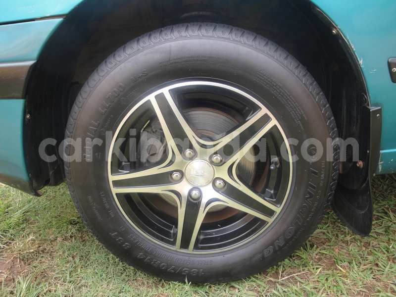 Big with watermark toyota carina e uganda kampala 8129