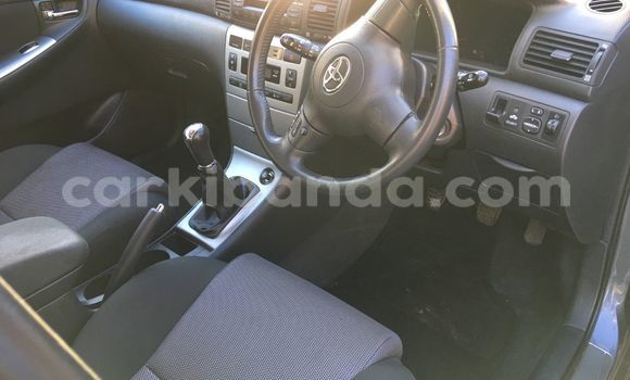 Gura Yakoze Toyota Corolla Beige Imodoka i Kampala mu Uganda Gura Yakoze Toyota Corolla Beige Imodoka i Kampala mu Uganda