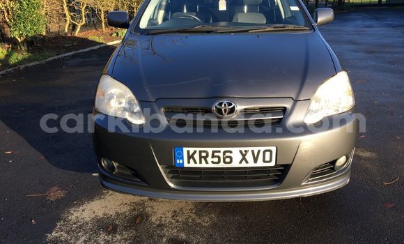 Gura Yakoze Toyota Corolla Beige Imodoka i Kampala mu Uganda Gura Yakoze Toyota Corolla Beige Imodoka i Kampala mu Uganda