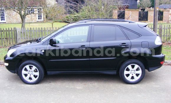 Gura Yakoze Toyota Harrier Black Imodoka i Kampala mu Uganda Gura Yakoze Toyota Harrier Black Imodoka i Kampala mu Uganda