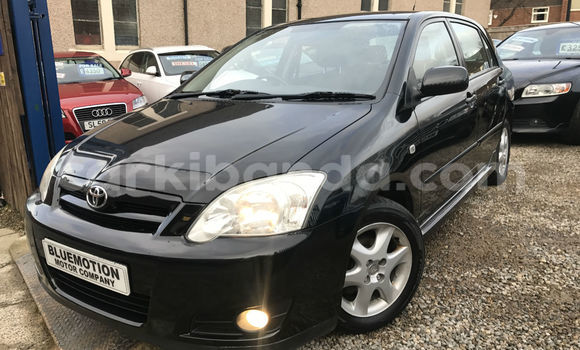 Gura Yakoze Toyota Corolla Black Imodoka i Kampala mu Uganda Gura Yakoze Toyota Corolla Black Imodoka i Kampala mu Uganda
