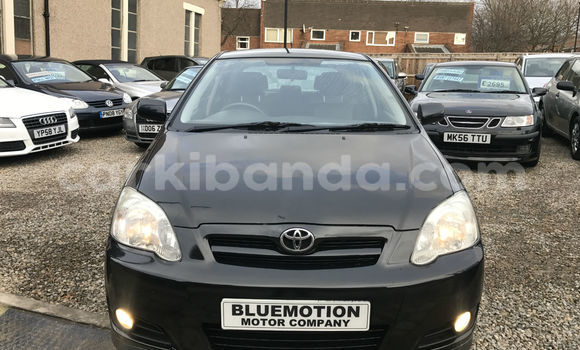 Gura Yakoze Toyota Corolla Black Imodoka i Kampala mu Uganda Gura Yakoze Toyota Corolla Black Imodoka i Kampala mu Uganda