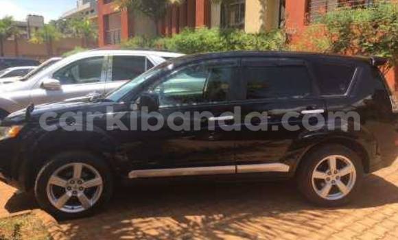 Gura Yakoze Mitsubishi Outlander Black Imodoka i Kampala mu Uganda Gura Yakoze Mitsubishi Outlander Black Imodoka i Kampala mu Uganda