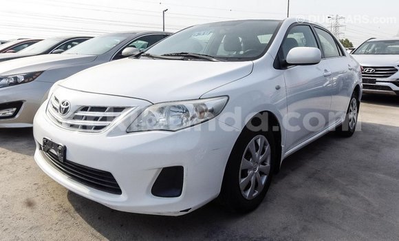 Buy Import Toyota Corolla White Car in Import - Dubai in Uganda Buy Import Toyota Corolla White Car in Import - Dubai in Uganda