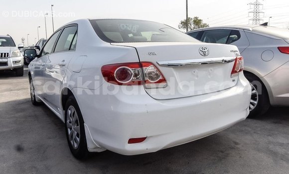 Buy Import Toyota Corolla White Car in Import - Dubai in Uganda Buy Import Toyota Corolla White Car in Import - Dubai in Uganda