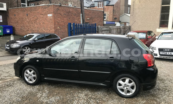 Gura Yakoze Toyota Corolla Black Imodoka i Kampala mu Uganda Gura Yakoze Toyota Corolla Black Imodoka i Kampala mu Uganda