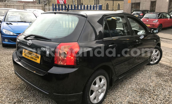 Gura Yakoze Toyota Corolla Black Imodoka i Kampala mu Uganda Gura Yakoze Toyota Corolla Black Imodoka i Kampala mu Uganda