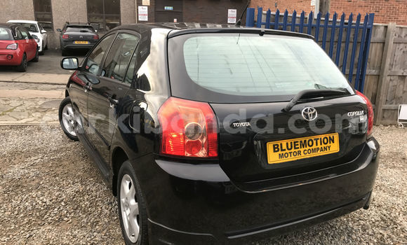 Gura Yakoze Toyota Corolla Black Imodoka i Kampala mu Uganda Gura Yakoze Toyota Corolla Black Imodoka i Kampala mu Uganda