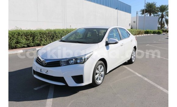 Buy Import Toyota Corolla White Car in Import - Dubai in Uganda Buy Import Toyota Corolla White Car in Import - Dubai in Uganda