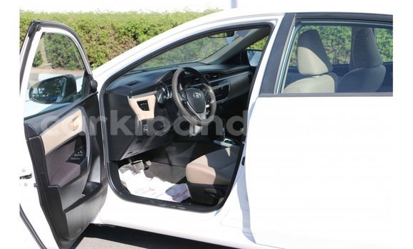 Buy Import Toyota Corolla White Car in Import - Dubai in Uganda Buy Import Toyota Corolla White Car in Import - Dubai in Uganda