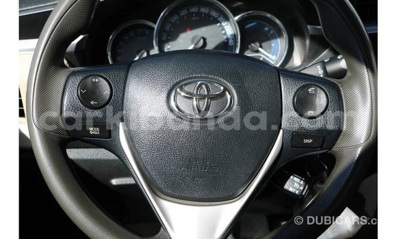 Buy Import Toyota Corolla White Car in Import - Dubai in Uganda Buy Import Toyota Corolla White Car in Import - Dubai in Uganda