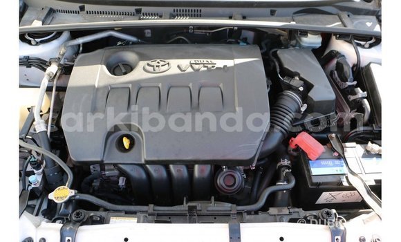 Buy Import Toyota Corolla White Car in Import - Dubai in Uganda Buy Import Toyota Corolla White Car in Import - Dubai in Uganda