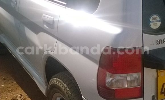 Gura Yakoze Mitsubishi Pajero Silver Imodoka i Kampala mu Uganda Gura Yakoze Mitsubishi Pajero Silver Imodoka i Kampala mu Uganda