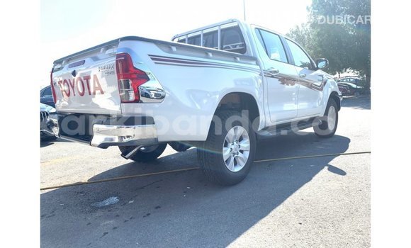 Gura Imported Toyota Hilux White Imodoka i Import - Dubai mu Uganda Gura Imported Toyota Hilux White Imodoka i Import - Dubai mu Uganda