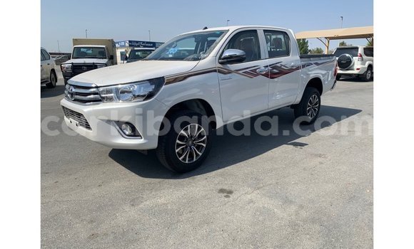 Gura Imported Toyota Hilux White Imodoka i Import - Dubai mu Uganda Gura Imported Toyota Hilux White Imodoka i Import - Dubai mu Uganda
